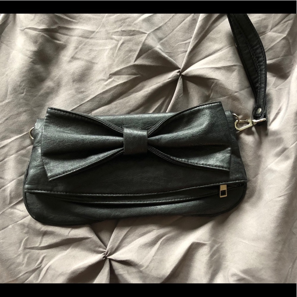 Fold over faux leather clutch